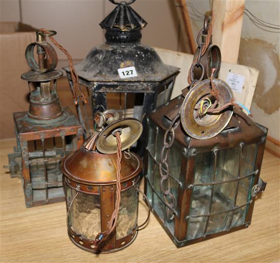 Four metal lanterns